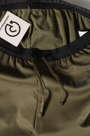 Damskie spodnie sportowe Nike, Rozmiar S, Kolor Zielony, Cena 247,89 zł