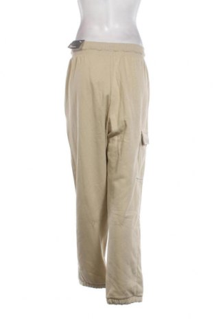Γυναικείο αθλητικό παντελόνι PUMA, Μέγεθος XL, Χρώμα  Μπέζ, Τιμή 25,89 €