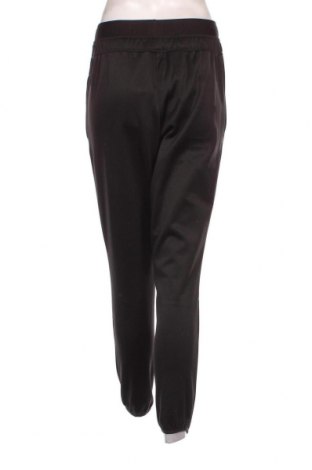 Γυναικείο αθλητικό παντελόνι PUMA, Μέγεθος S, Χρώμα Μαύρο, Τιμή 25,89 €