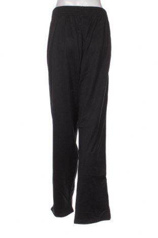 Γυναικείο αθλητικό παντελόνι Uncle Sam, Μέγεθος XL, Χρώμα Μαύρο, Τιμή 9,69 €