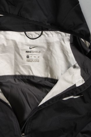 Γυναικείο μπουφάν Nike, Μέγεθος XS, Χρώμα Μαύρο, Τιμή 39,00 €