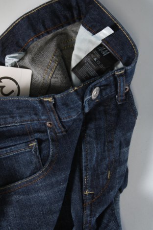 Dziecięce jeansy H&M, Rozmiar 12-13y/ 158-164 cm, Kolor Niebieski, Cena 35,82 zł
