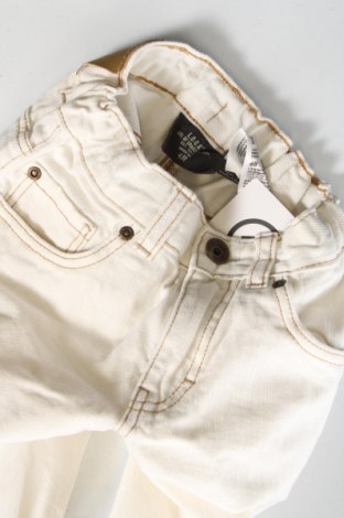 Dziecięce jeansy H&M L.O.G.G., Rozmiar 12-18m/ 80-86 cm, Kolor Biały, Cena 38,83 zł