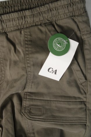 Dziecięce spodnie C&A, Rozmiar 15-18y/ 170-176 cm, Kolor Zielony, Cena 64,21 zł