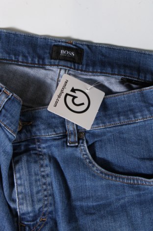 Męskie jeansy BOSS, Rozmiar L, Kolor Niebieski, Cena 338,18 zł