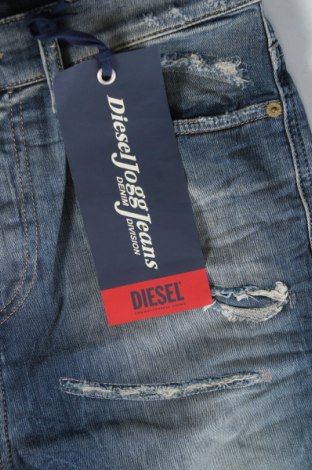 Męskie jeansy Diesel, Rozmiar M, Kolor Niebieski, Cena 666,42 zł