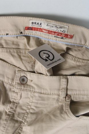 Męskie spodnie Brax, Rozmiar XL, Kolor Beżowy, Cena 198,31 zł