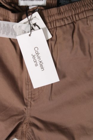 Męskie spodnie Calvin Klein Jeans, Rozmiar S, Kolor Brązowy, Cena 415,81 zł