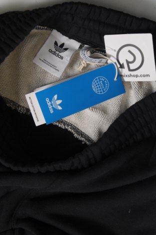 Męskie spodnie sportowe Adidas Originals, Rozmiar S, Kolor Czarny, Cena 210,71 zł