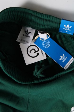Męskie spodnie sportowe Adidas Originals, Rozmiar S, Kolor Zielony, Cena 210,71 zł