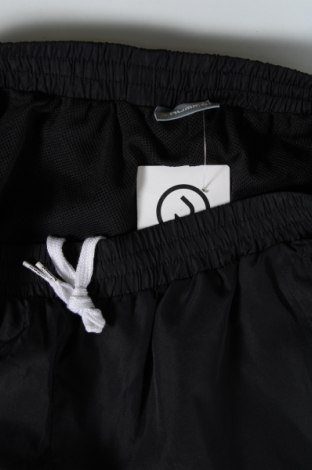 Ανδρικό αθλητικό παντελόνι Hummel, Μέγεθος L, Χρώμα Μαύρο, Τιμή 13,86 €