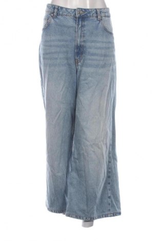 Damskie jeansy H&M Divided, Rozmiar XL, Kolor Niebieski, Cena 66,67 zł