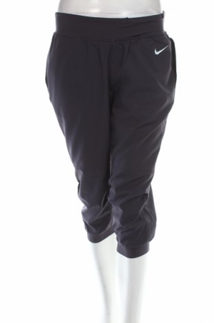 Dámske tepláky Nike, Veľkosť M, Farba Modrá, Polyester, Cena 8,42 €