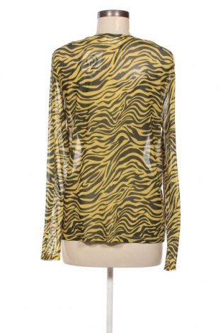 Γυναικεία μπλούζα City life, Μέγεθος L, Χρώμα Κίτρινο, Τιμή 2,35 €
