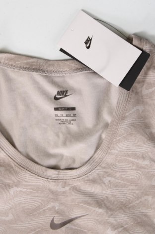 Γυναικεία μπλούζα Nike, Μέγεθος XS, Χρώμα  Μπέζ, Τιμή 39,39 €