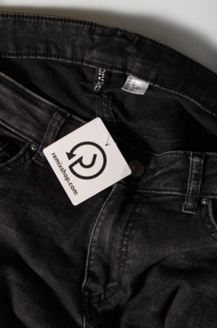 Damskie jeansy H&M Divided, Rozmiar L, Kolor Czarny, Cena 50,09 zł
