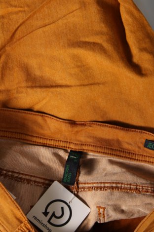 Damskie jeansy United Colors Of Benetton, Rozmiar M, Kolor Pomarańczowy, Cena 26,23 zł