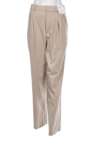 Γυναικείο παντελόνι Uniqlo, Μέγεθος S, Χρώμα  Μπέζ, Τιμή 29,76 €