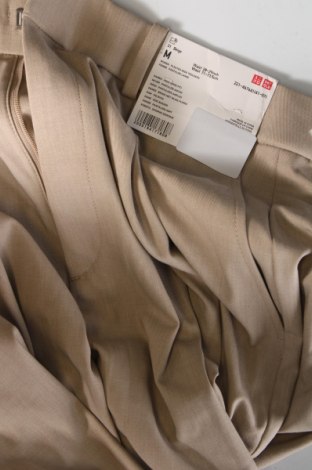 Дамски панталон Uniqlo, Размер M, Цвят Бежов, Цена 29,38 лв.
