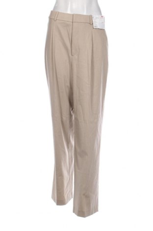 Γυναικείο παντελόνι Uniqlo, Μέγεθος M, Χρώμα  Μπέζ, Τιμή 29,76 €