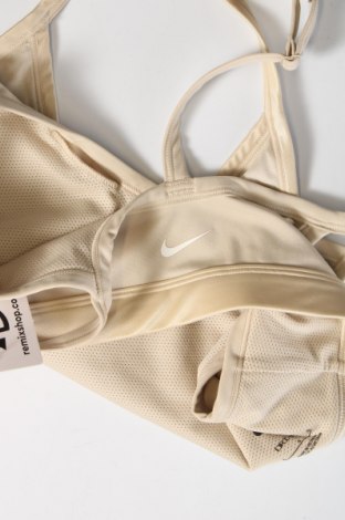 Damen Sporttop Nike, Größe L, Farbe Beige, Preis 20,04 €