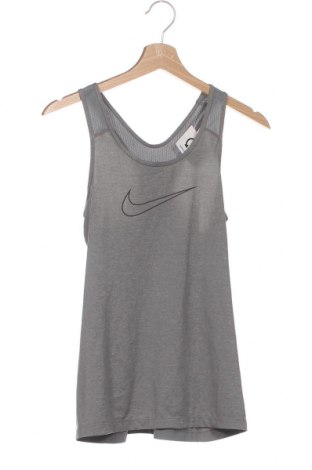 Γυναίκειο αθλητικό τοπ Nike, Μέγεθος XS, Χρώμα Γκρί, Τιμή 17,36 €