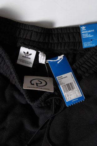Damskie spodnie sportowe Adidas Originals, Rozmiar M, Kolor Czarny, Cena 247,89 zł