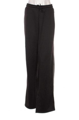 Γυναικείο αθλητικό παντελόνι Amisu, Μέγεθος XL, Χρώμα Μαύρο, Τιμή 10,76 €