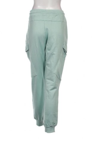 Γυναικείο αθλητικό παντελόνι Guess, Μέγεθος M, Χρώμα Μπλέ, Τιμή 72,16 €