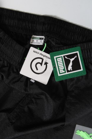 Γυναικείο αθλητικό παντελόνι PUMA, Μέγεθος XS, Χρώμα Μαύρο, Τιμή 27,33 €