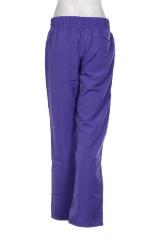 Γυναικείο αθλητικό παντελόνι PUMA, Μέγεθος M, Χρώμα Βιολετί, Τιμή 24,45 €