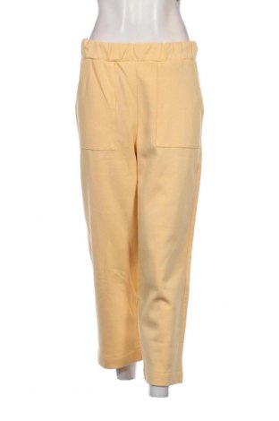 Γυναικείο αθλητικό παντελόνι Tom Tailor, Μέγεθος M, Χρώμα Κίτρινο, Τιμή 14,38 €