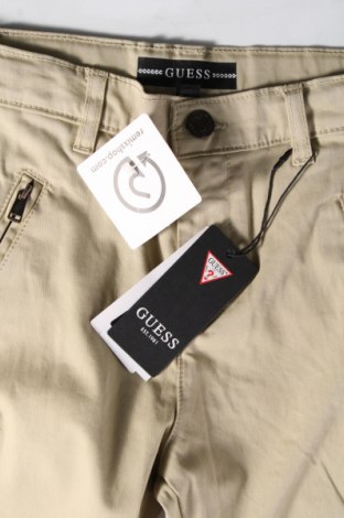 Dětské kalhoty  Guess, Velikost 7-8y/ 128-134 cm, Barva Béžová, Cena  768,00 Kč