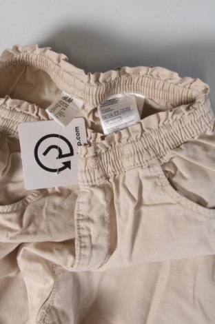 Dziecięce spodnie H&M, Rozmiar 7-8y/ 128-134 cm, Kolor Beżowy, Cena 40,14 zł