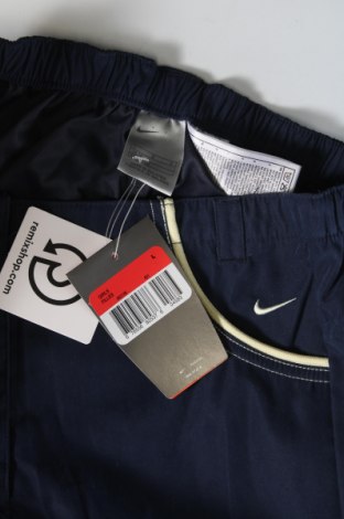 Детски спортен панталон Nike, Размер 11-12y/ 152-158 см, Цвят Син, Цена 39,69 лв.
