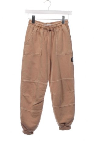 Dziecięce spodnie sportowe Calvin Klein Jeans, Rozmiar 11-12y/ 152-158 cm, Kolor Beżowy, Cena 122,34 zł