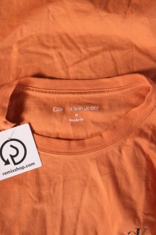 Herren T-Shirt Calvin Klein Jeans, Größe M, Farbe Orange, Preis € 39,69