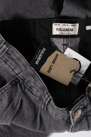 Męskie jeansy Pull&Bear, Rozmiar M, Kolor Niebieski, Cena 69,89 zł