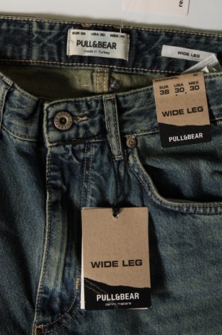 Męskie jeansy Pull&Bear, Rozmiar S, Kolor Niebieski, Cena 122,61 zł