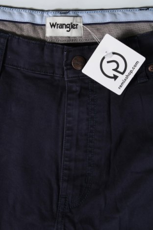 Męskie jeansy Wrangler, Rozmiar L, Kolor Niebieski, Cena 170,32 zł