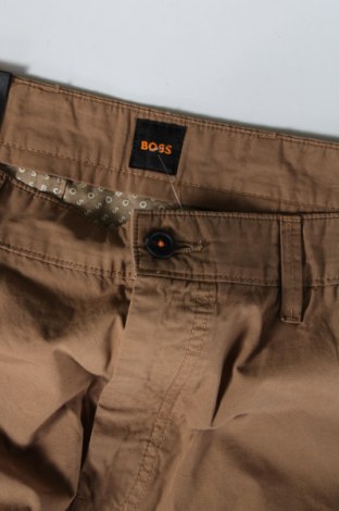 Męskie spodnie BOSS, Rozmiar L, Kolor Beżowy, Cena 169,26 zł