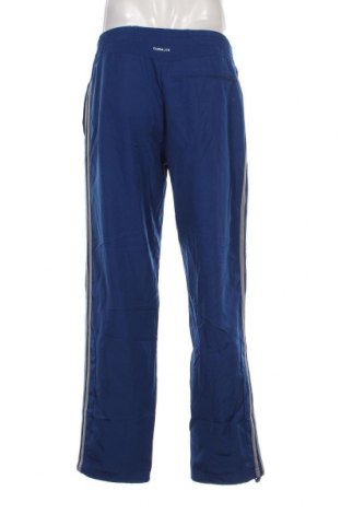 Pantaloni trening de bărbați Adidas, Mărime M, Culoare Albastru, Preț 180,92 Lei