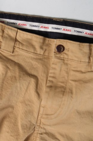 Pánské kalhoty  Tommy Jeans, Velikost S, Barva Béžová, Cena  414,00 Kč
