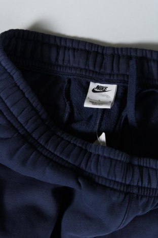 Męskie spodnie sportowe Nike, Rozmiar L, Kolor Niebieski, Cena 247,89 zł