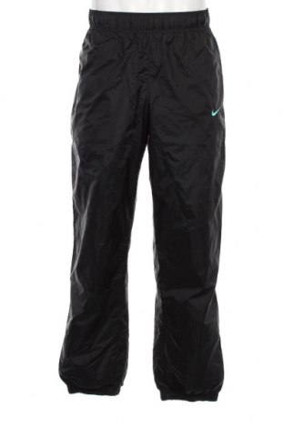 Ανδρικό αθλητικό παντελόνι Nike, Μέγεθος M, Χρώμα Μαύρο, Τιμή 25,36 €
