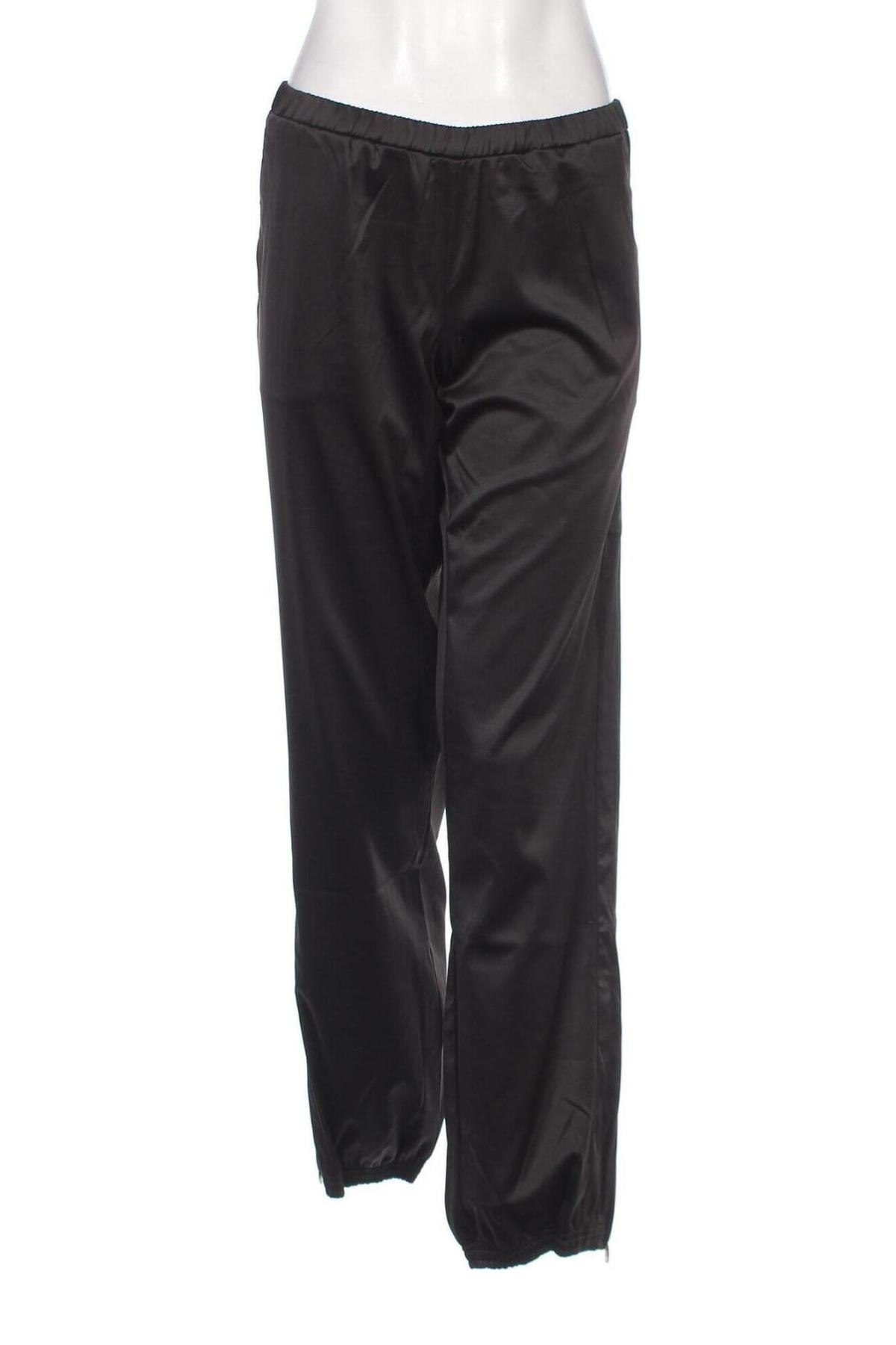Γυναικείο αθλητικό παντελόνι PUMA, Μέγεθος M, Χρώμα Μαύρο, Τιμή 24,45 €