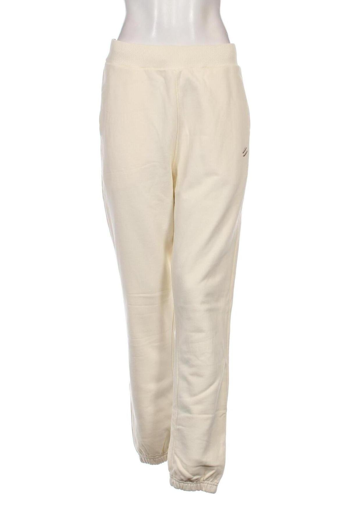 Γυναικείο αθλητικό παντελόνι Superdry, Μέγεθος M, Χρώμα Εκρού, Τιμή 24,49 €