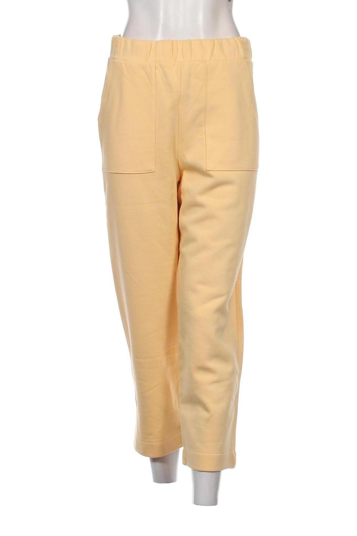 Γυναικείο αθλητικό παντελόνι Tom Tailor, Μέγεθος S, Χρώμα Κίτρινο, Τιμή 14,38 €