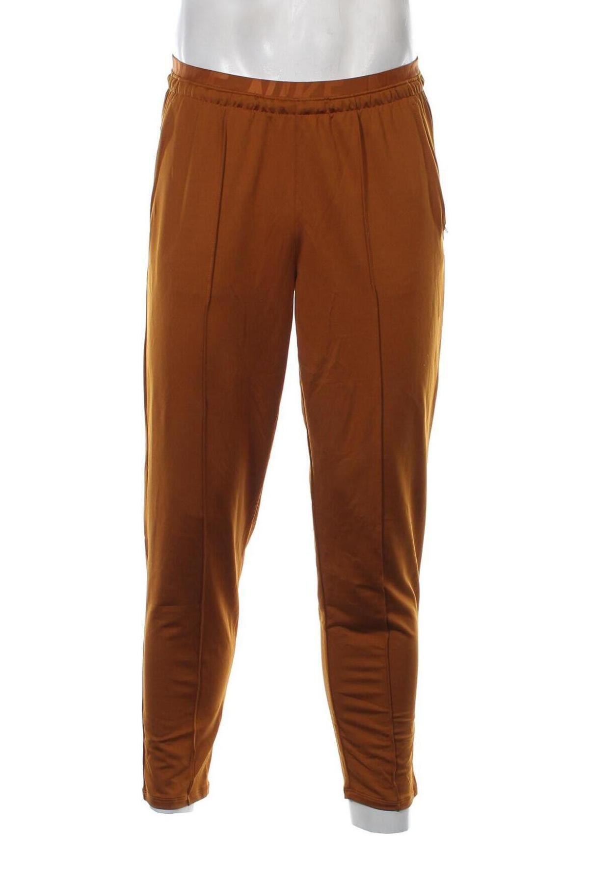 Ανδρικό αθλητικό παντελόνι Nike, Μέγεθος M, Χρώμα Πορτοκαλί, Τιμή 25,36 €