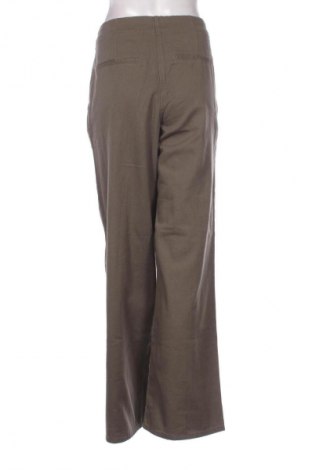 Damskie spodnie H&M, Rozmiar L, Kolor Zielony, Cena 103,45 zł